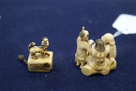 Four Japanese ivory netsuke, an okimono, an octopus and rats, a shi-shi maiju type netsuke, and two figure groups